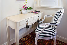 Striped chair at desk